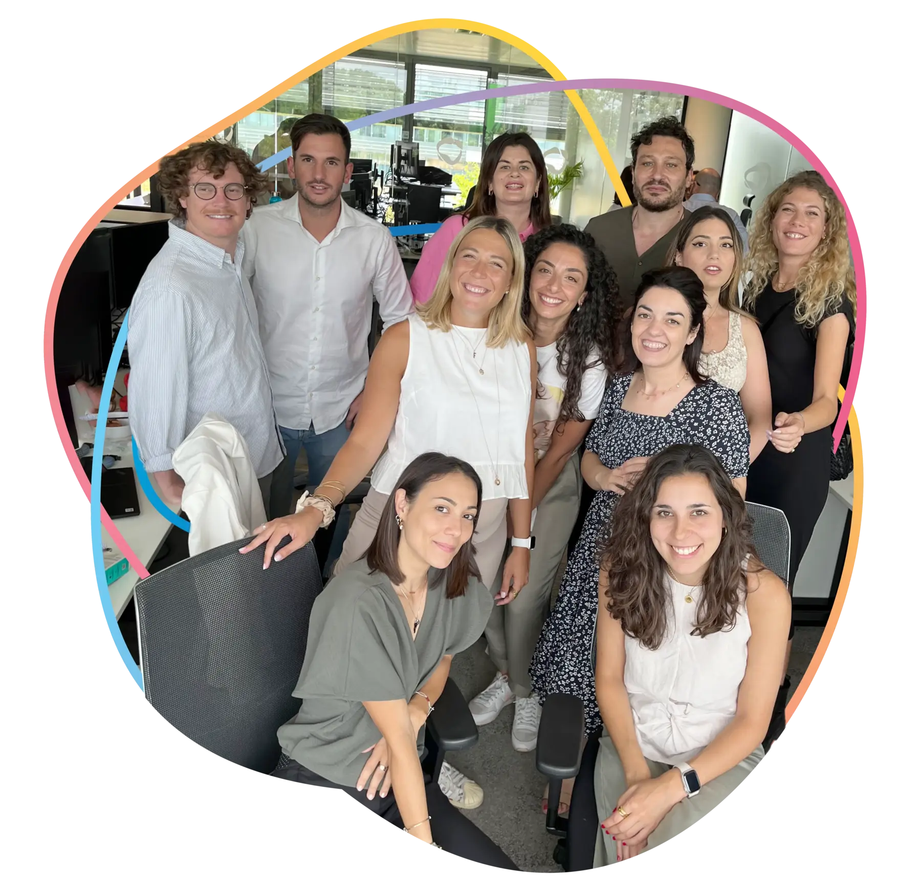 A group picture of some of the Talkwalker team, happily gathered together in the office.